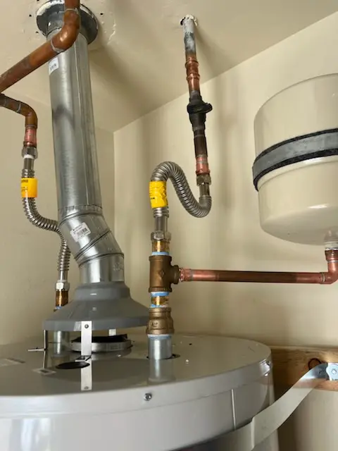 Water heater installation and plumbing repair in Lester